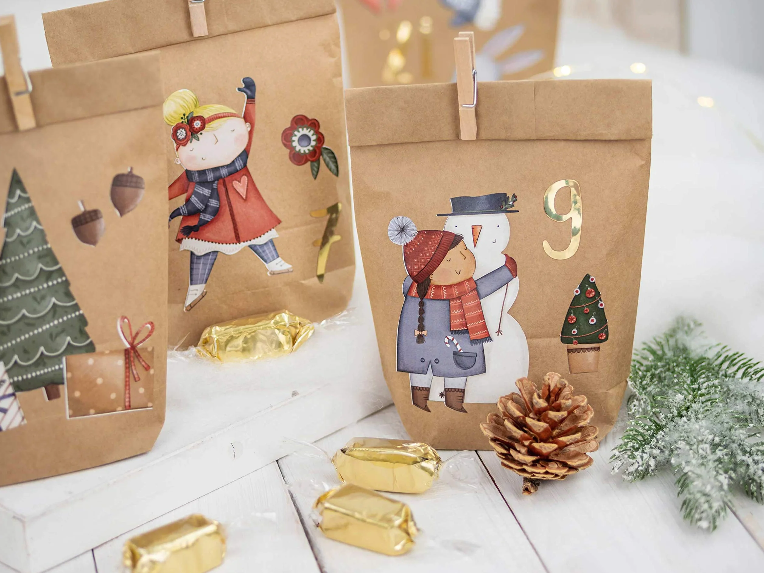 Papierdrachen DIY kalendarz adwentowy łyżwiarz 24 brązowe papierowe torebki naklejki Boże Narodzenie