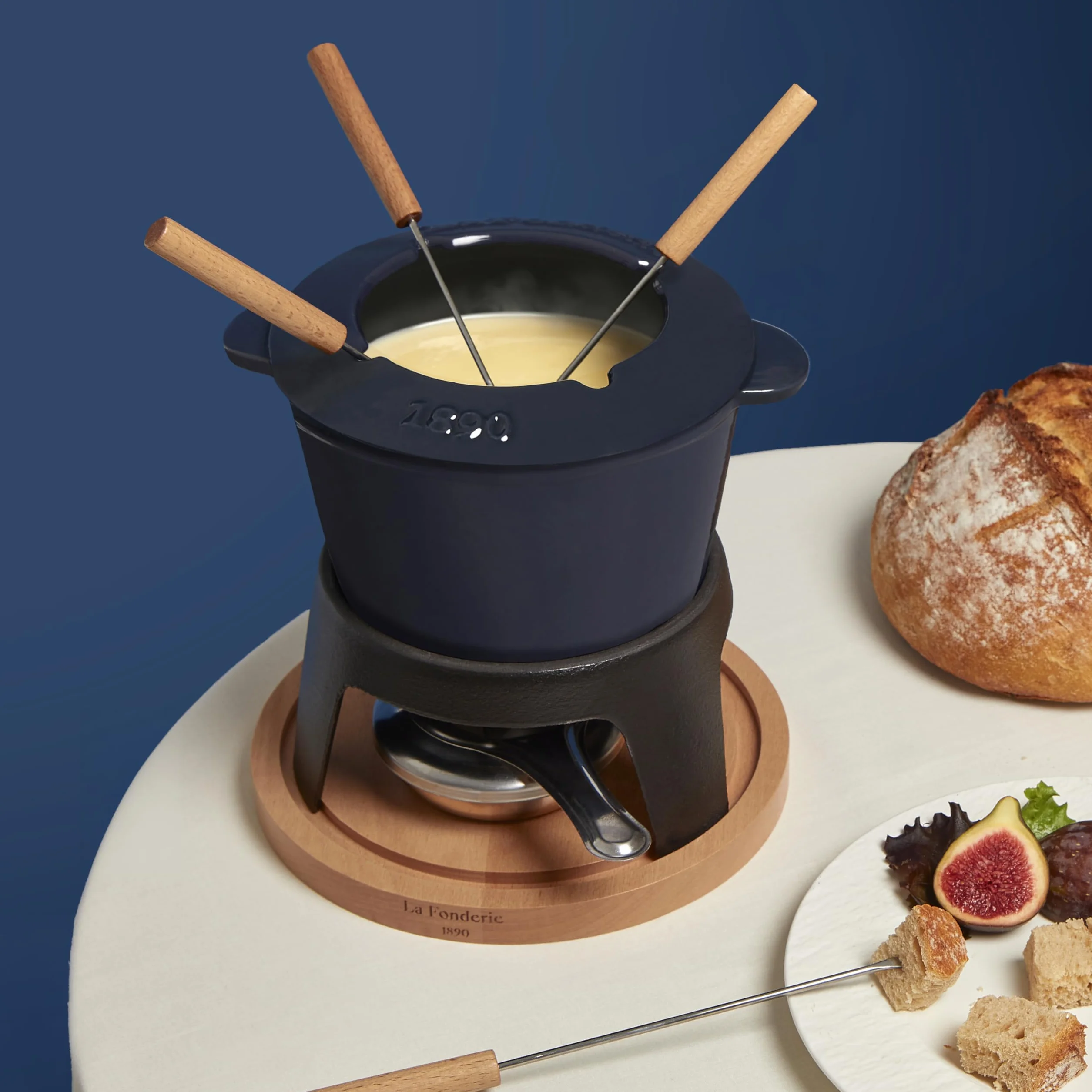 Żeliwny zestaw do fondue 4-osobowy 1,2 L z drewna bukowego
