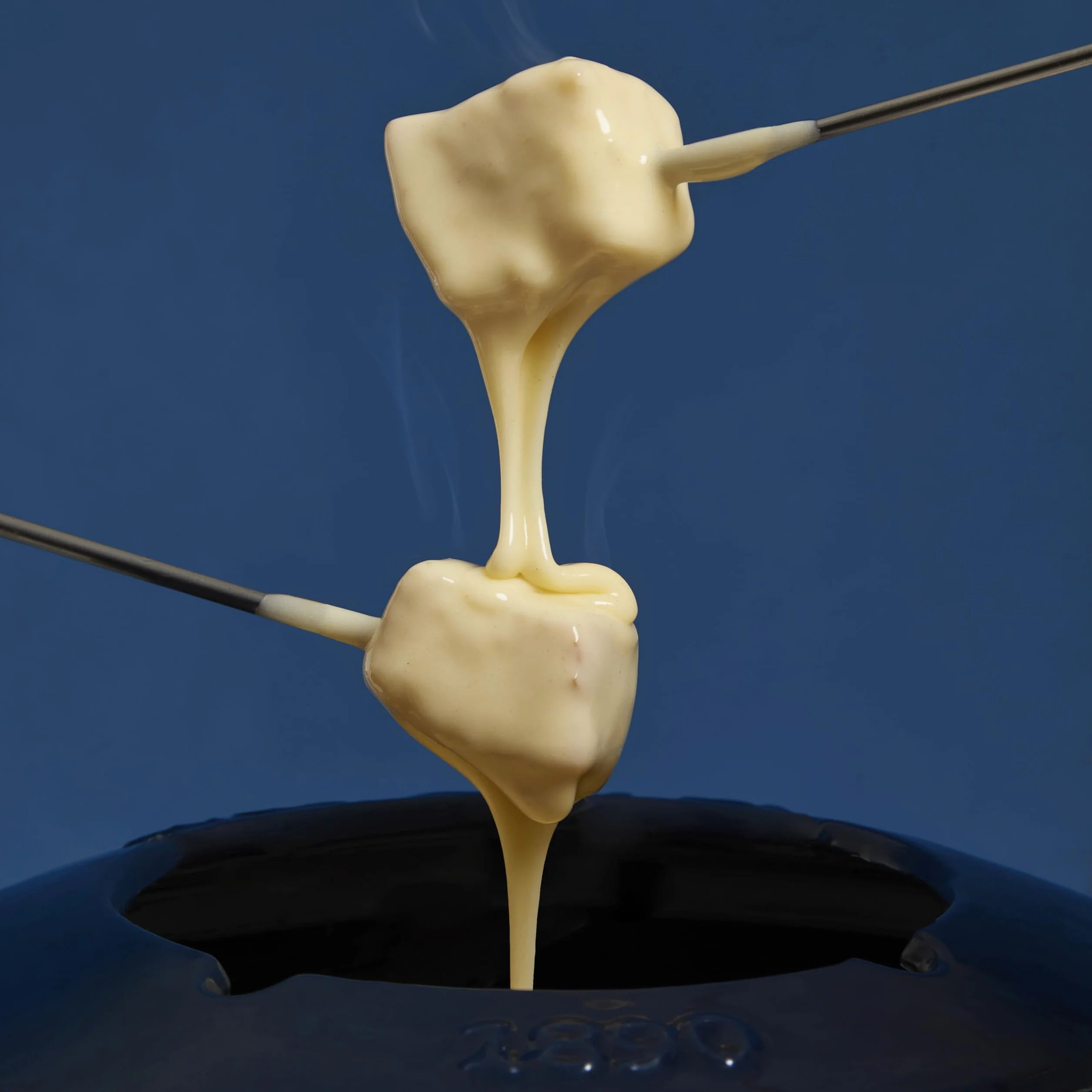 Żeliwny zestaw do fondue 4-osobowy 1,2 L z drewna bukowego