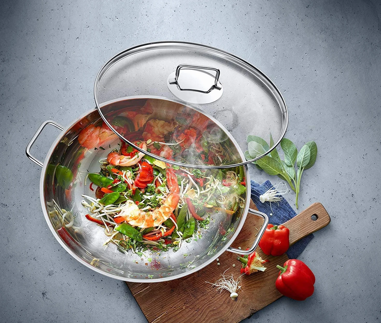 WMF Macao 2-częściowy zestaw do woków indukcyjnych, patelnia wok 36 cm ze szklaną pokrywką, polerowana stal nierdzewna Cromargan, niepowlekana