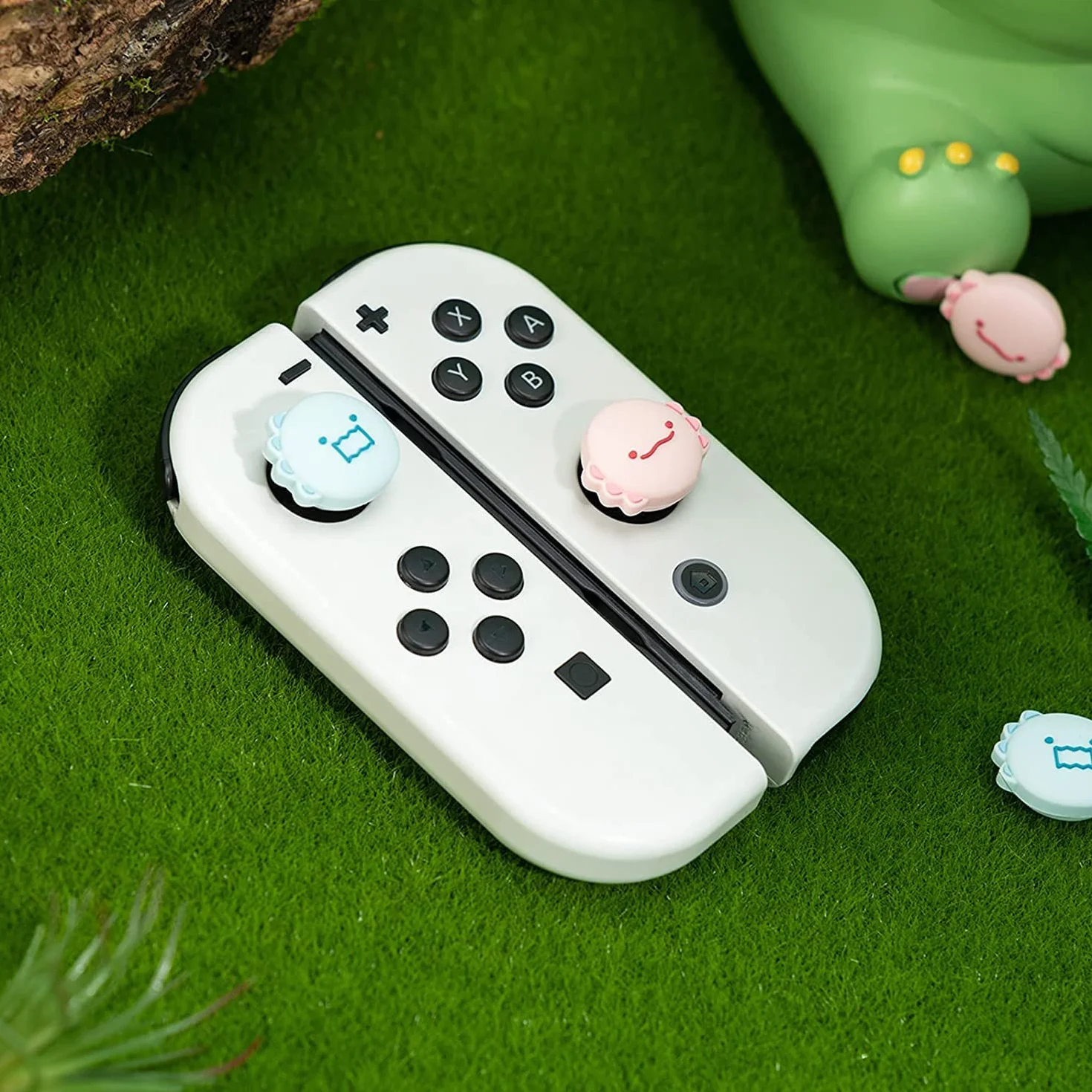 GeekShare Śliczne silikonowe nakładki na kciuk Joycon, pokrowiec na joystick kompatybilny z Nintendo Switch/OLED/Switch Lite, 4 szt., dinozaur i aksolotl